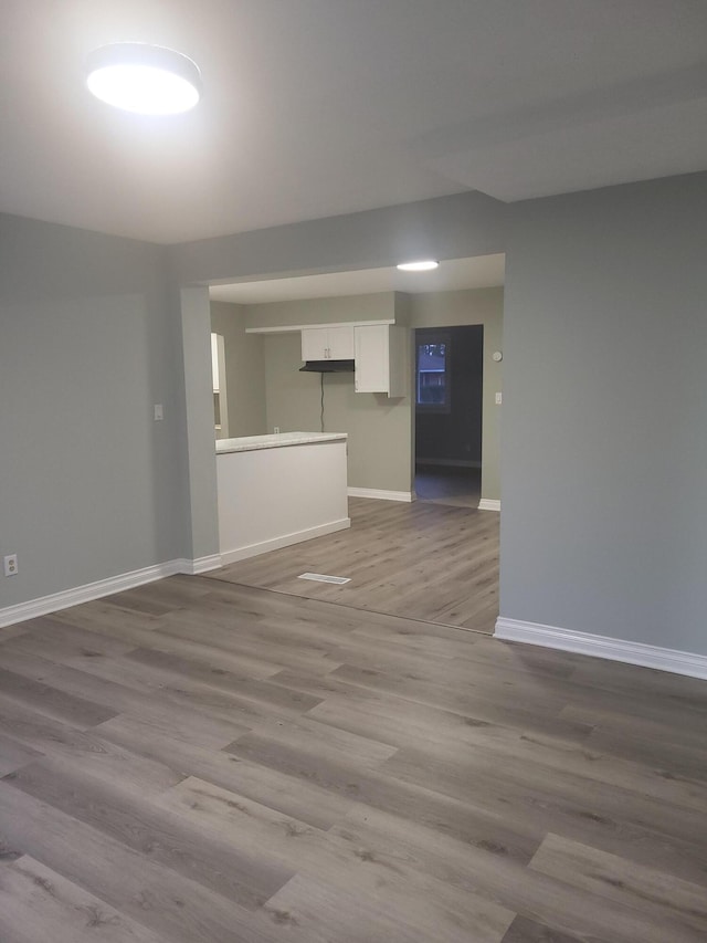 spare room featuring light wood-type flooring