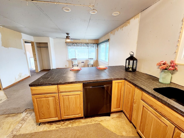 kitchen featuring kitchen peninsula, ceiling fan, dishwasher, and light colored carpet