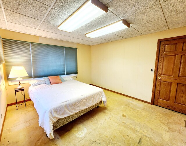 bedroom featuring a drop ceiling