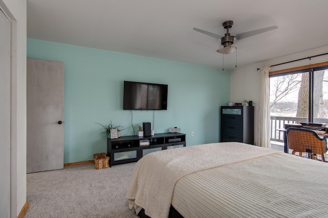 carpeted bedroom featuring ceiling fan and access to exterior