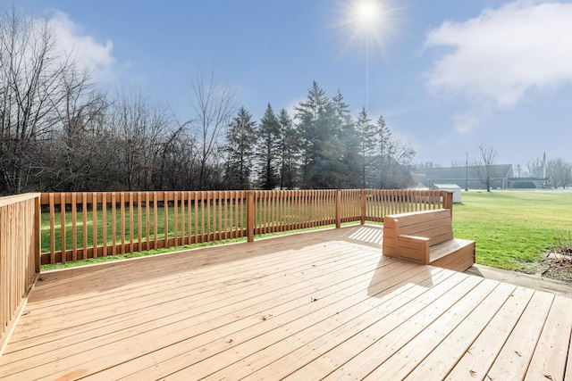 deck featuring a lawn