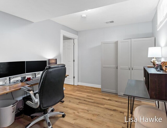 home office featuring light wood-type flooring