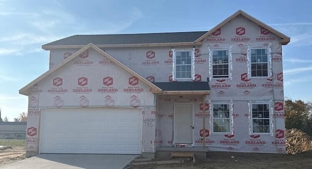 property under construction featuring a garage