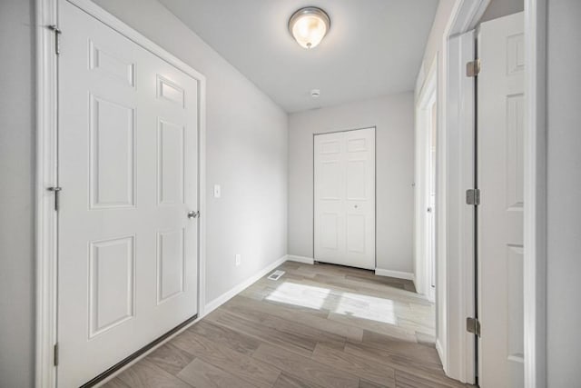 hall featuring light wood-type flooring