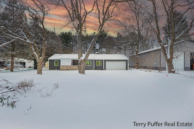 view of front of home featuring a garage