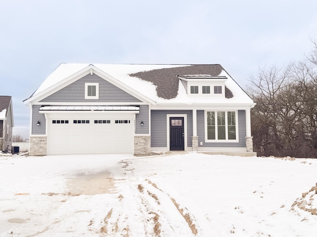 view of front of home with a garage