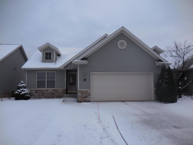 view of front of property with a garage