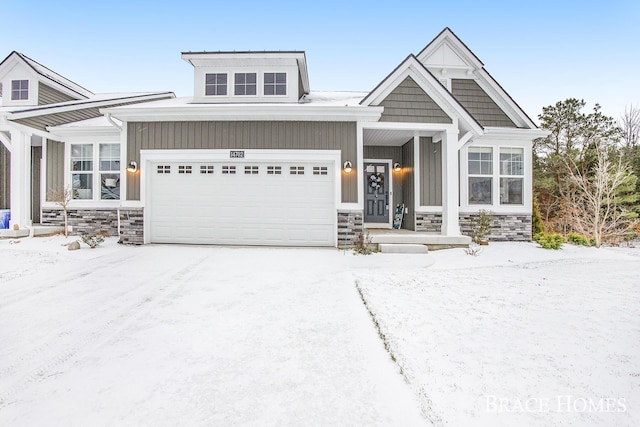 craftsman inspired home featuring a garage