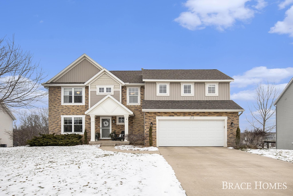 view of front of home with a garage