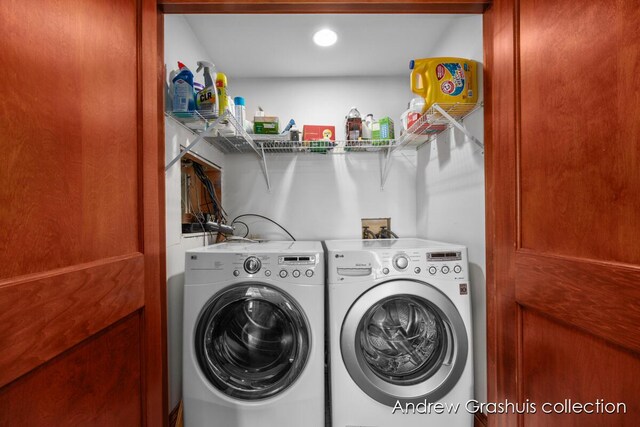 laundry area with washing machine and clothes dryer