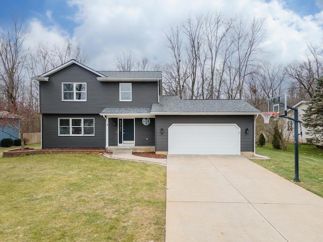 view of property with a front yard and a garage