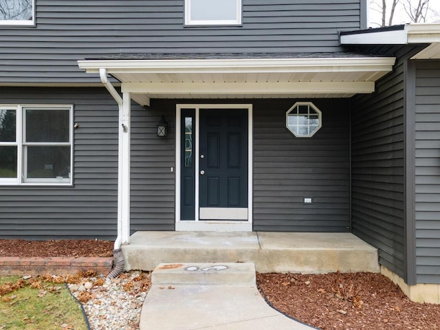 doorway to property with covered porch