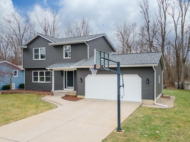 view of front facade with a garage and a front lawn