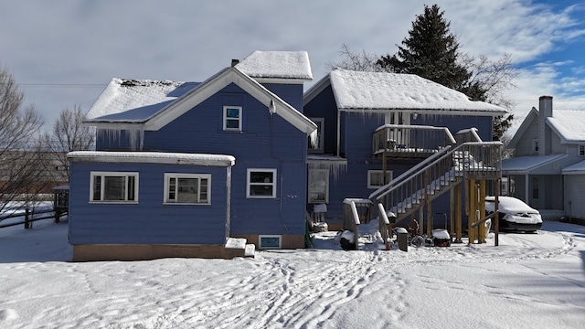 view of snow covered property