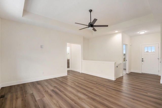 interior space featuring wood finished floors, baseboards, visible vents, ceiling fan, and recessed lighting