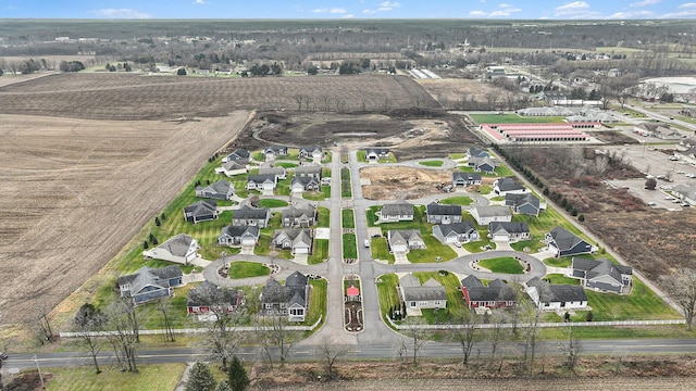 aerial view with a rural view and a residential view