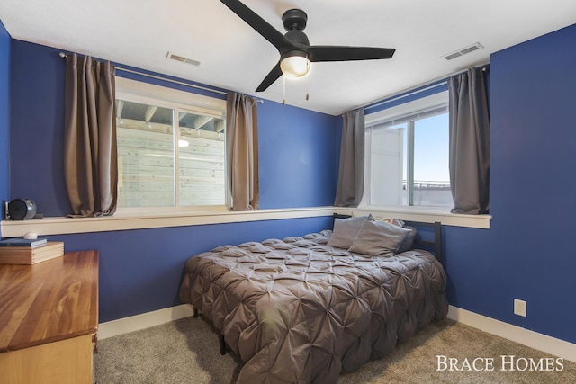 carpeted bedroom featuring ceiling fan