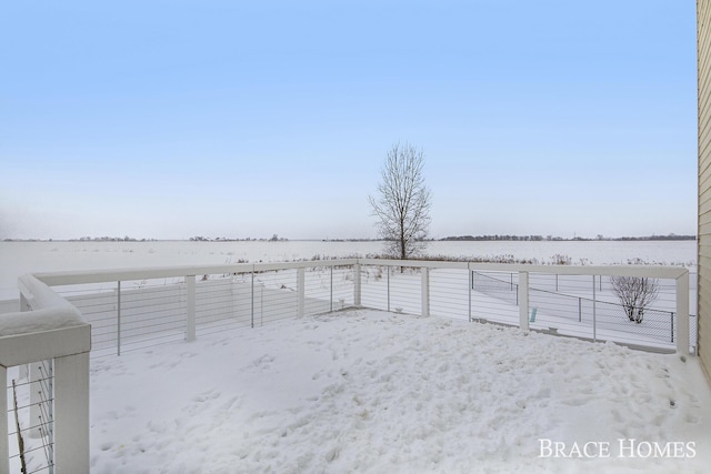 view of yard layered in snow