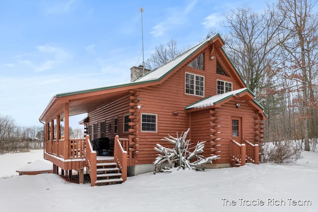 view of snow covered property