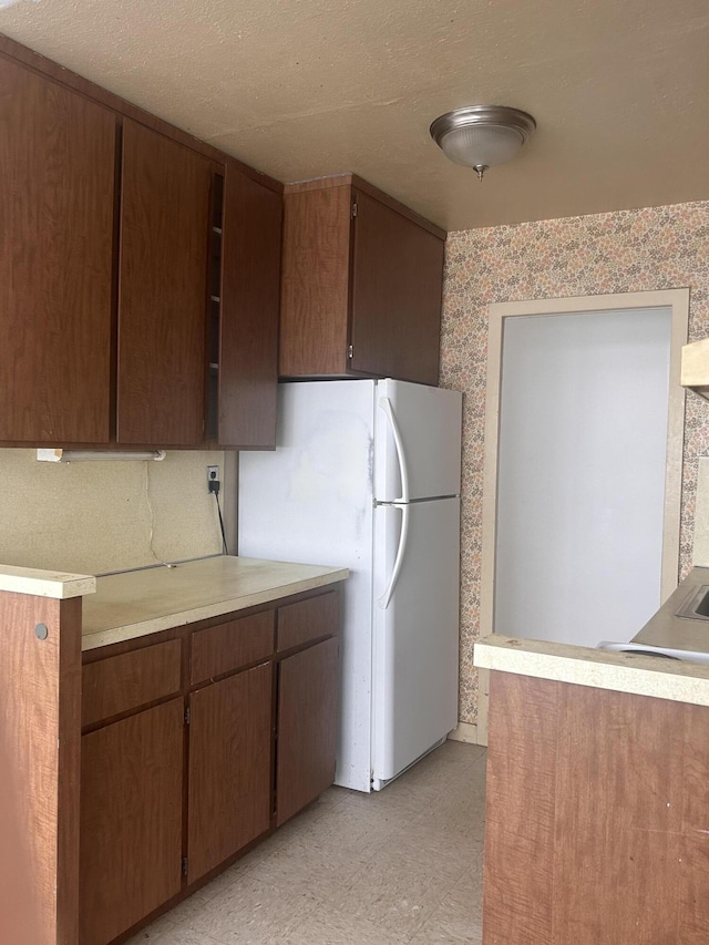 kitchen featuring white refrigerator