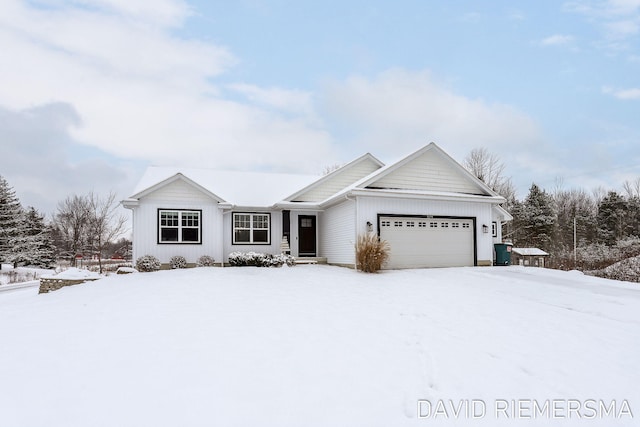 single story home featuring a garage