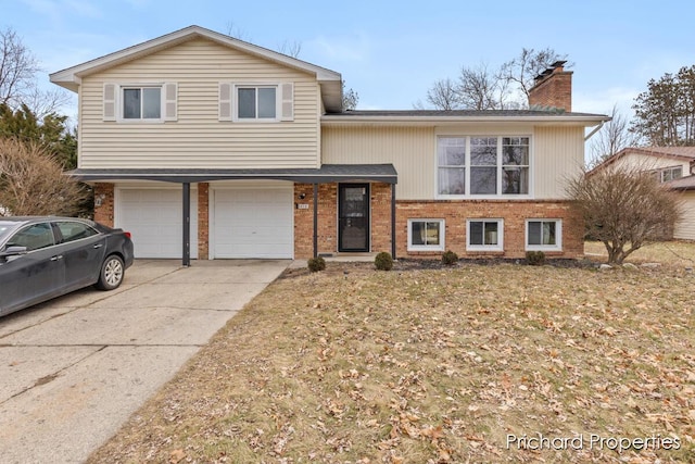 split level home with a garage