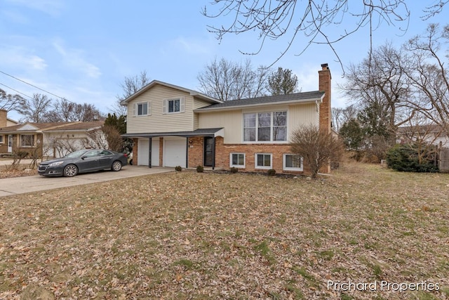 view of front facade with a front lawn and a garage