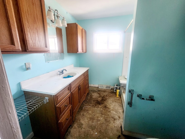 bathroom with visible vents and vanity