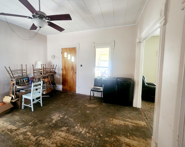 interior space featuring ceiling fan