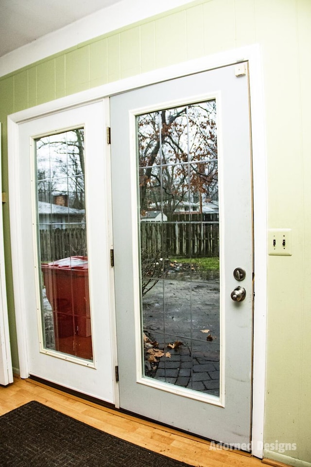 doorway with light hardwood / wood-style flooring