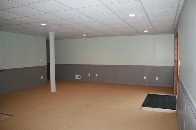 basement with light colored carpet