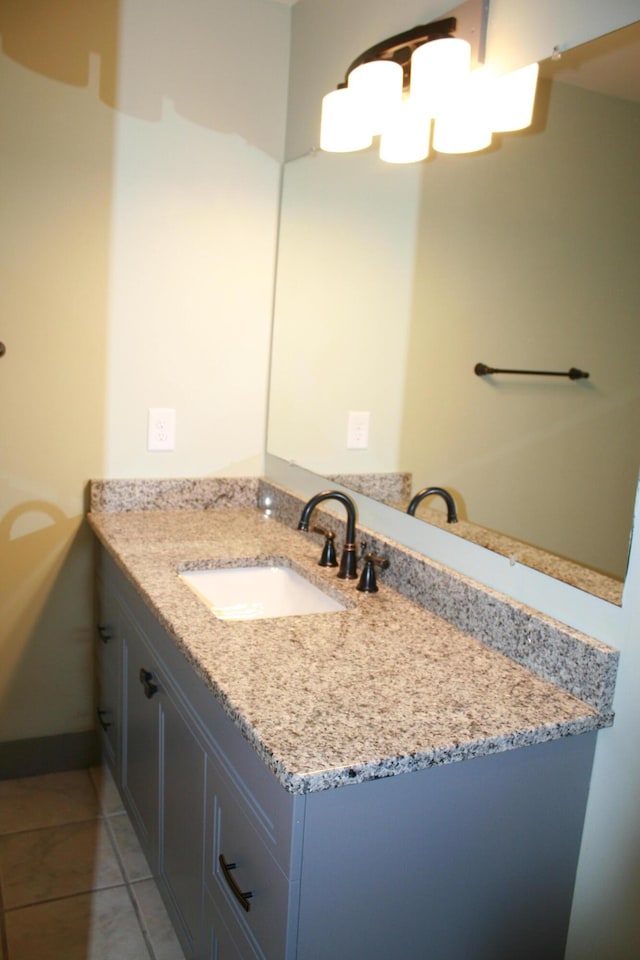 bathroom featuring vanity and tile patterned flooring