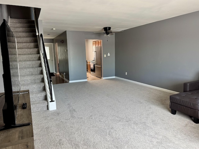 living room featuring ceiling fan