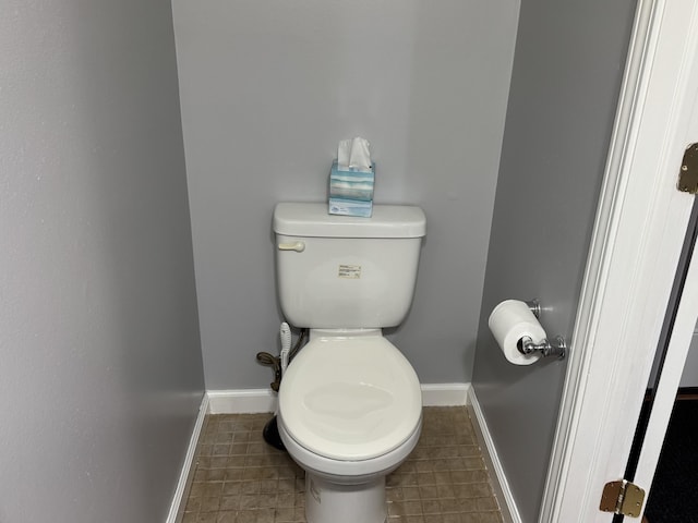 bathroom featuring toilet