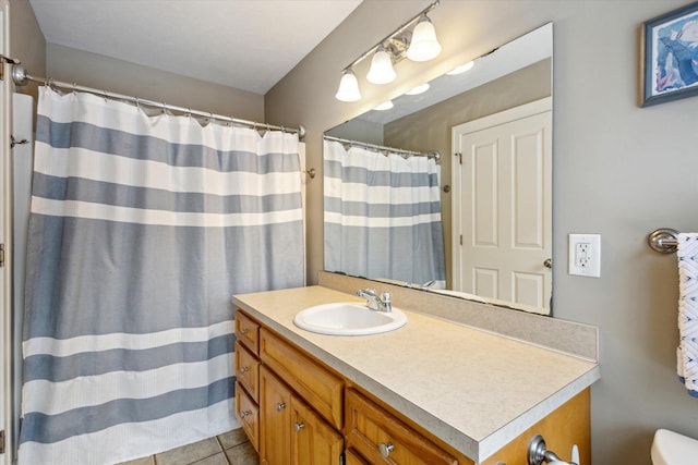 bathroom with vanity and tile patterned floors