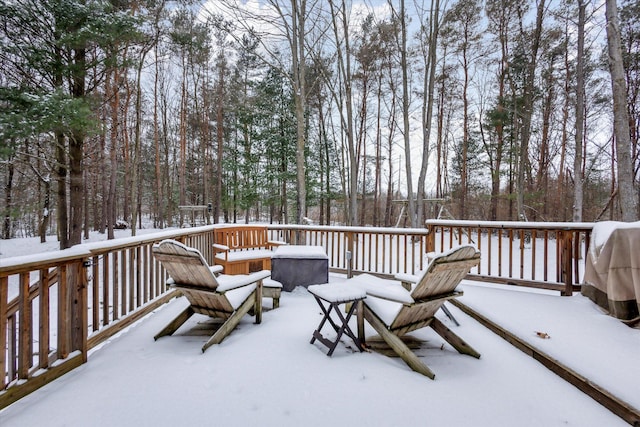 view of snow covered deck