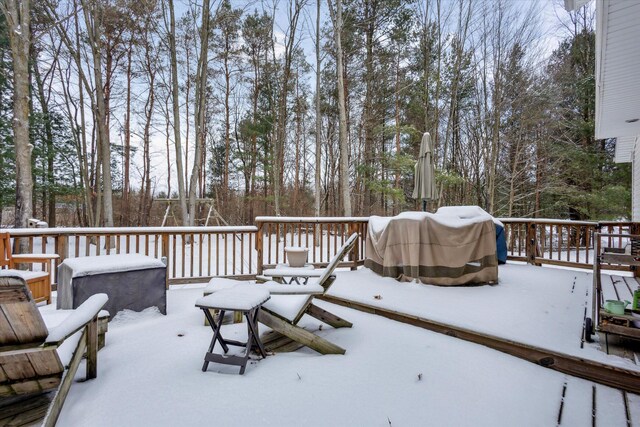 view of snow covered deck