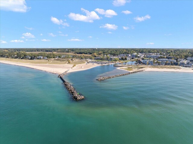 aerial view featuring a water view and a view of the beach