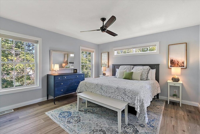 bedroom featuring ceiling fan and light wood-type flooring