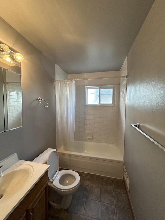 full bathroom with vanity, shower / tub combo with curtain, tile patterned floors, and toilet