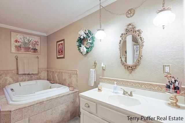 bathroom with vanity, ornamental molding, and tiled bath