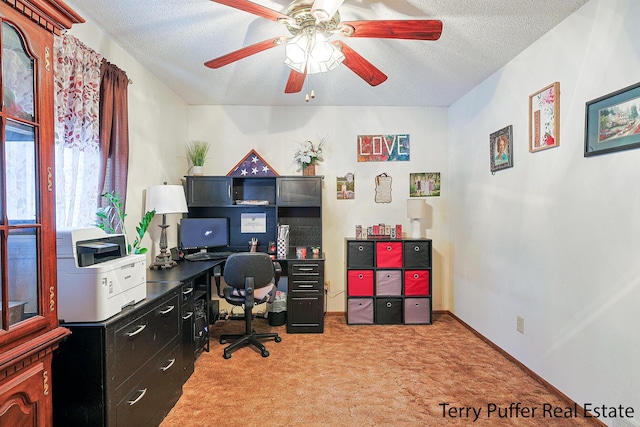 office with ceiling fan, light carpet, and a textured ceiling