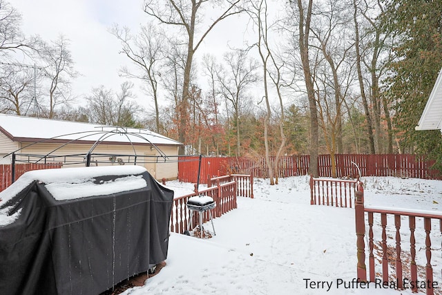 view of yard covered in snow