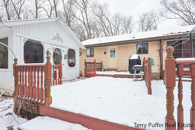 view of snow covered property