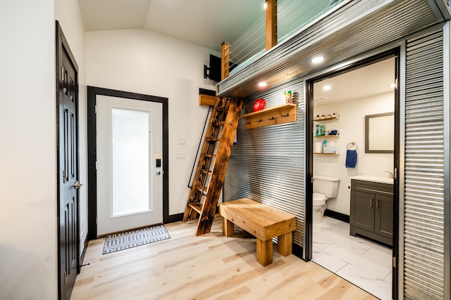 mudroom with lofted ceiling