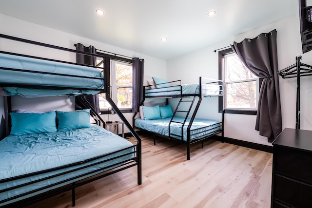 bedroom with light wood-type flooring