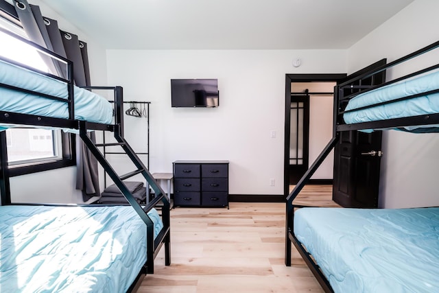 bedroom featuring light wood-type flooring