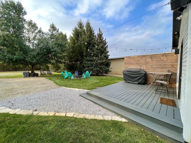 view of yard with a wooden deck