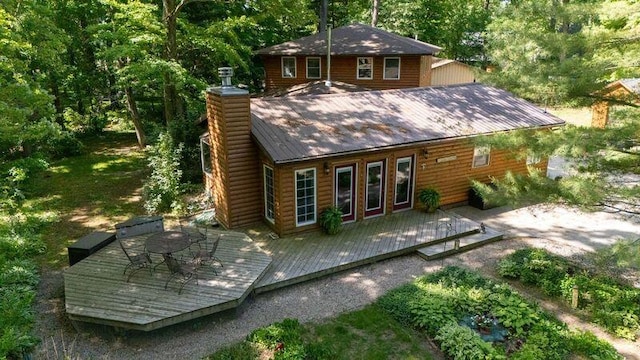 rear view of house with a deck