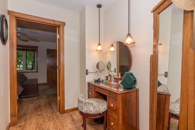 hall with light hardwood / wood-style floors